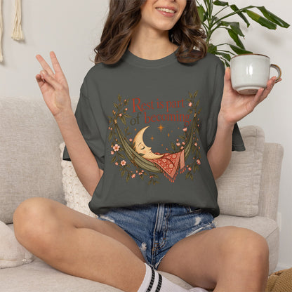 Rest Is Part of Becoming T-Shirt — Relaxation Graphic Tee with Hammock and Floral Design