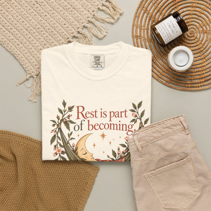 Rest Is Part of Becoming T-Shirt — Relaxation Graphic Tee with Hammock and Floral Design