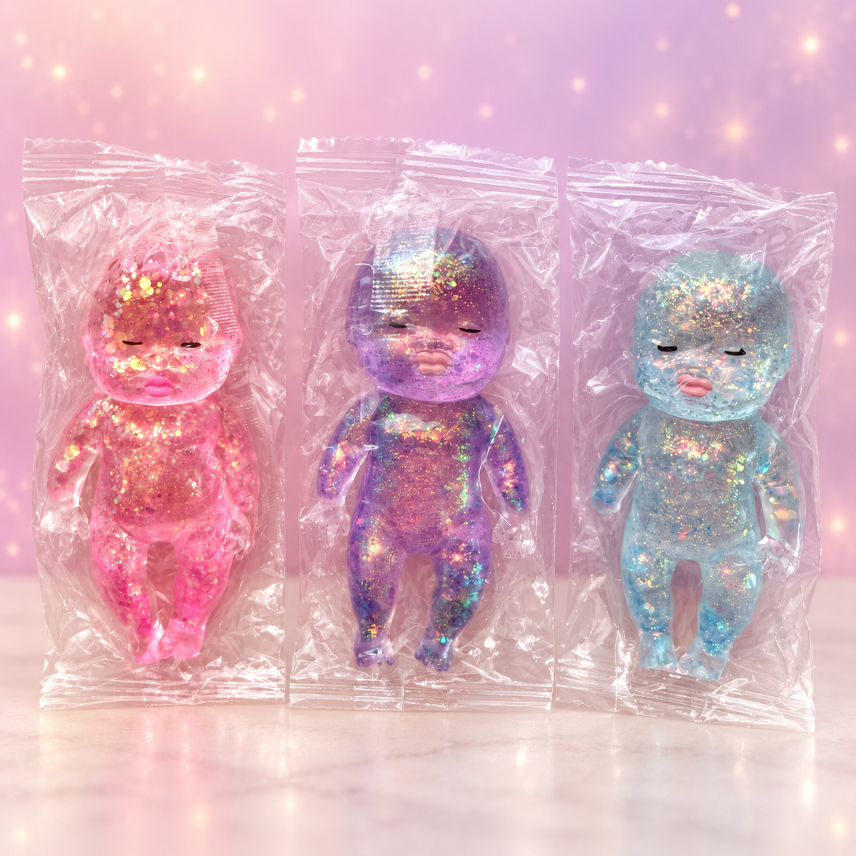 Glitter Doll Squishy Toy | Pink, Purple or Blue